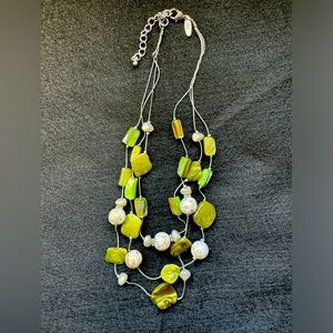 20” silver-metallic 3 strand beaded necklace.